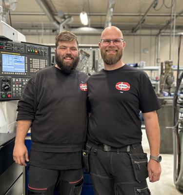 Ricki and Paw in the JEROS lathe department